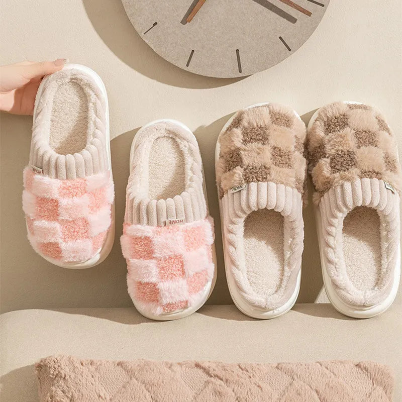 Women's plaid patterned plush slippers with coral velvet upper and non-slip PVC sole in coffee colour.
