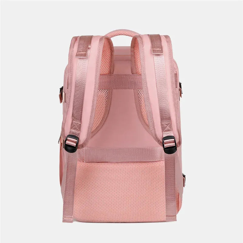 Large purple travel backpack with multiple compartments shown open to reveal organisational pockets