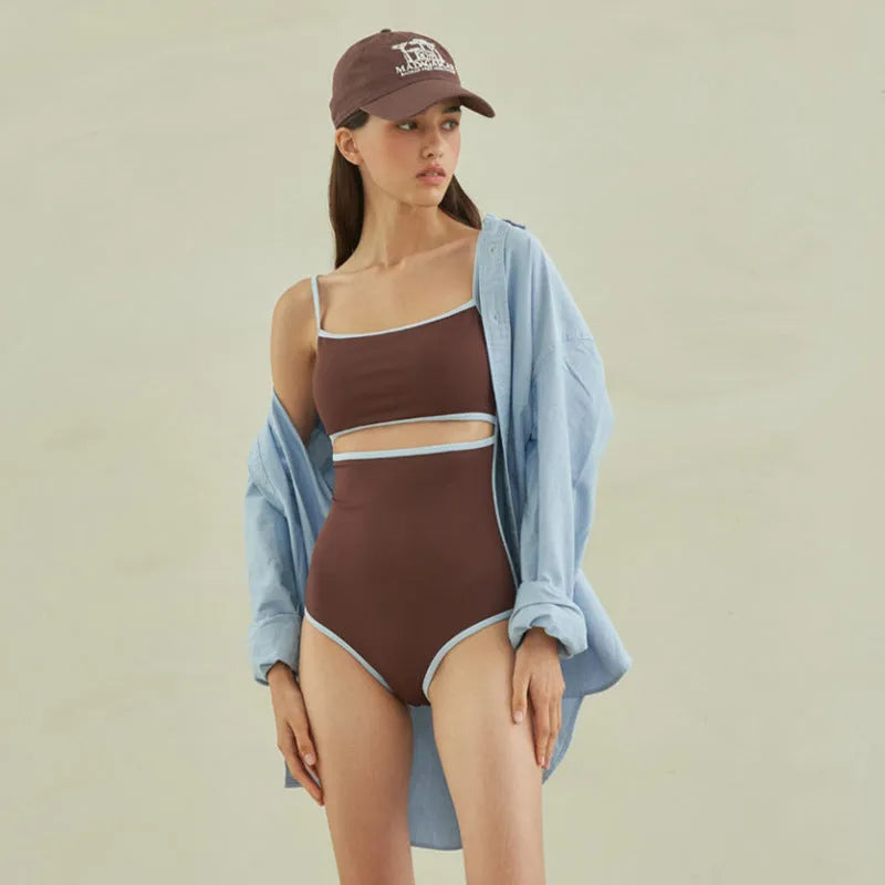 Brown women's one-piece swimsuit with triangle top design and sexy pattern