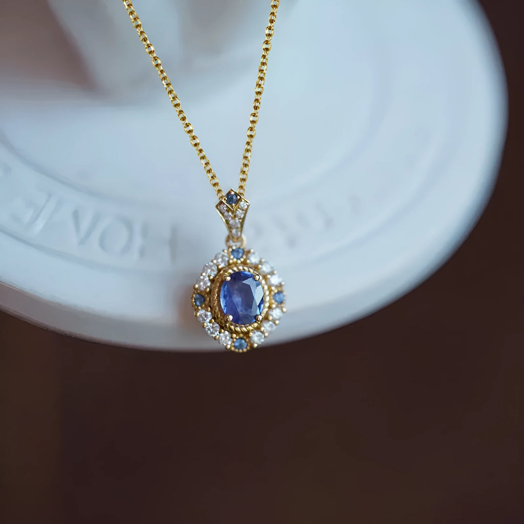 Adjustable women's necklace with mixed gemstone pendant on gold-colour box chain