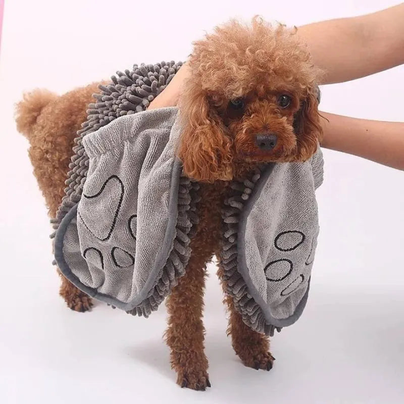 Blue dog bath towel with quick-dry absorbent fibre, measuring 62cm by 23cm.