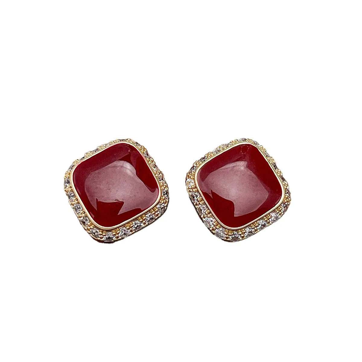 Red geometric square earrings with inlaid design details on alloy material