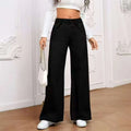 Plus size light blue washed wide-leg denim jeans on a hanger, showing straight leg cut.