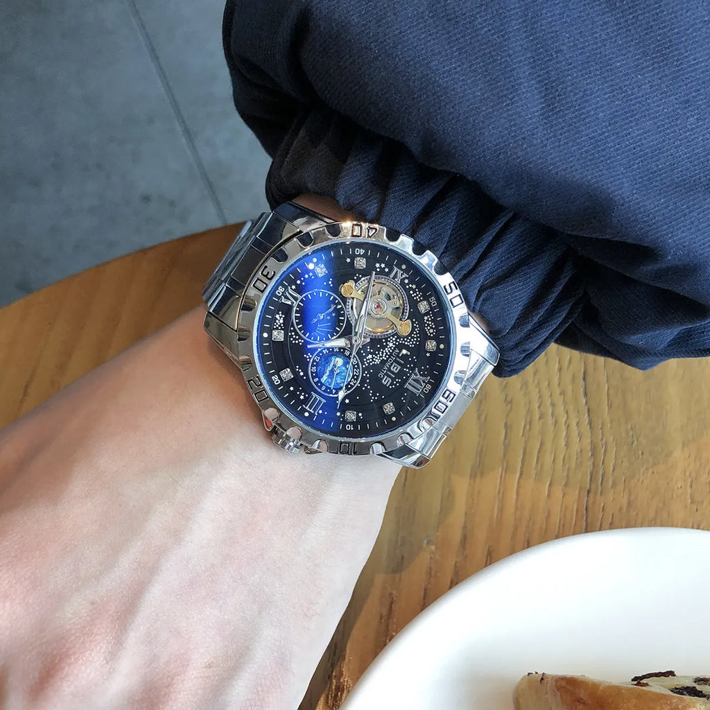 Men's silver case automatic mechanical watch with black starry dial and luminous hands on genuine leather strap