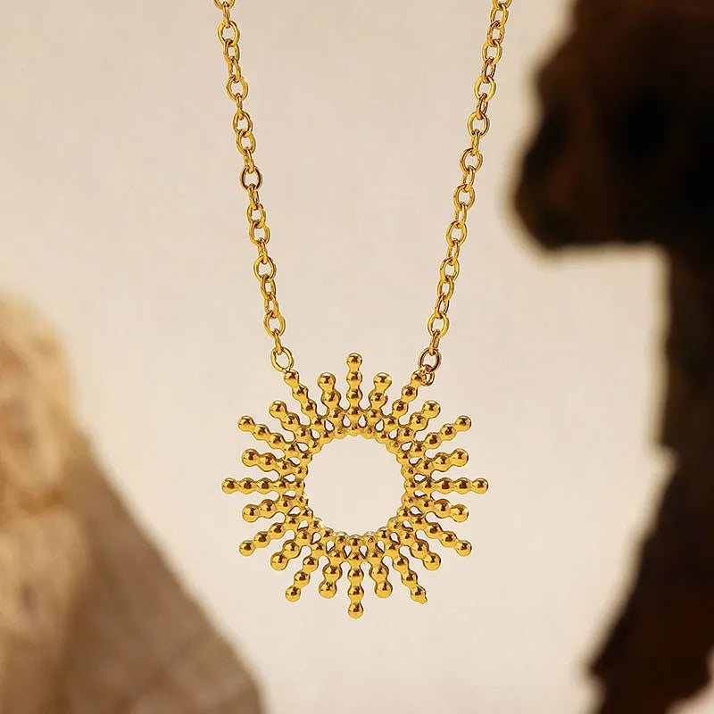 Gold plated stainless steel sunflower necklace and bracelet set with geometric chain design for women
