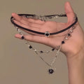 Women's multi-layer twin necklace set with heart pendants on adjustable clavicle chain