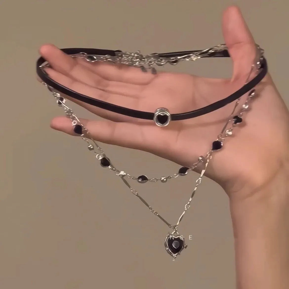 Women's multi-layer twin necklace set with heart pendants on adjustable clavicle chain