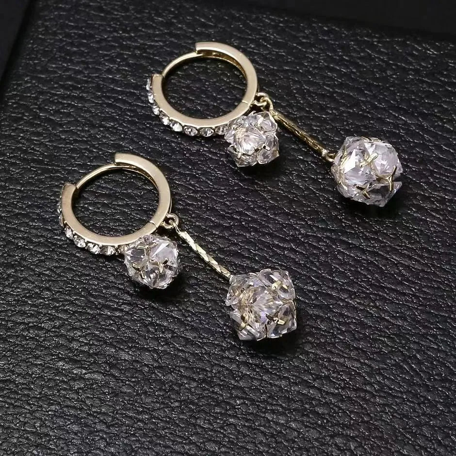 Women's silver drop earrings with confession balloon and rhinestone ball pendants and tassel detailing