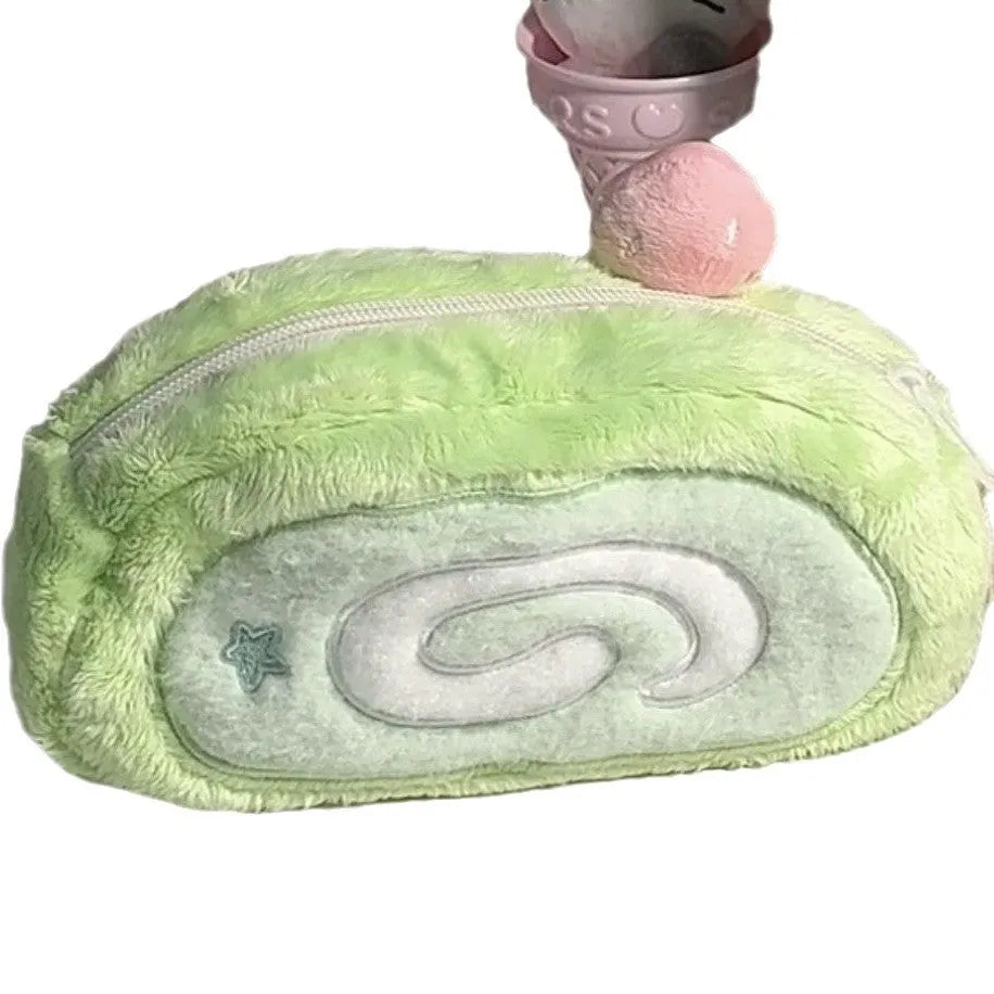 Grey and cream Swiss roll cake design velvet pencil case rolled up with pens visible