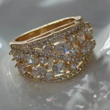 Women's round hollow copper fashion ring showing open design with metal plating and coloured accent options
