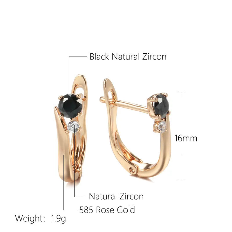 Women's drop shape earrings with black agate stones and gold-plated copper geometric design