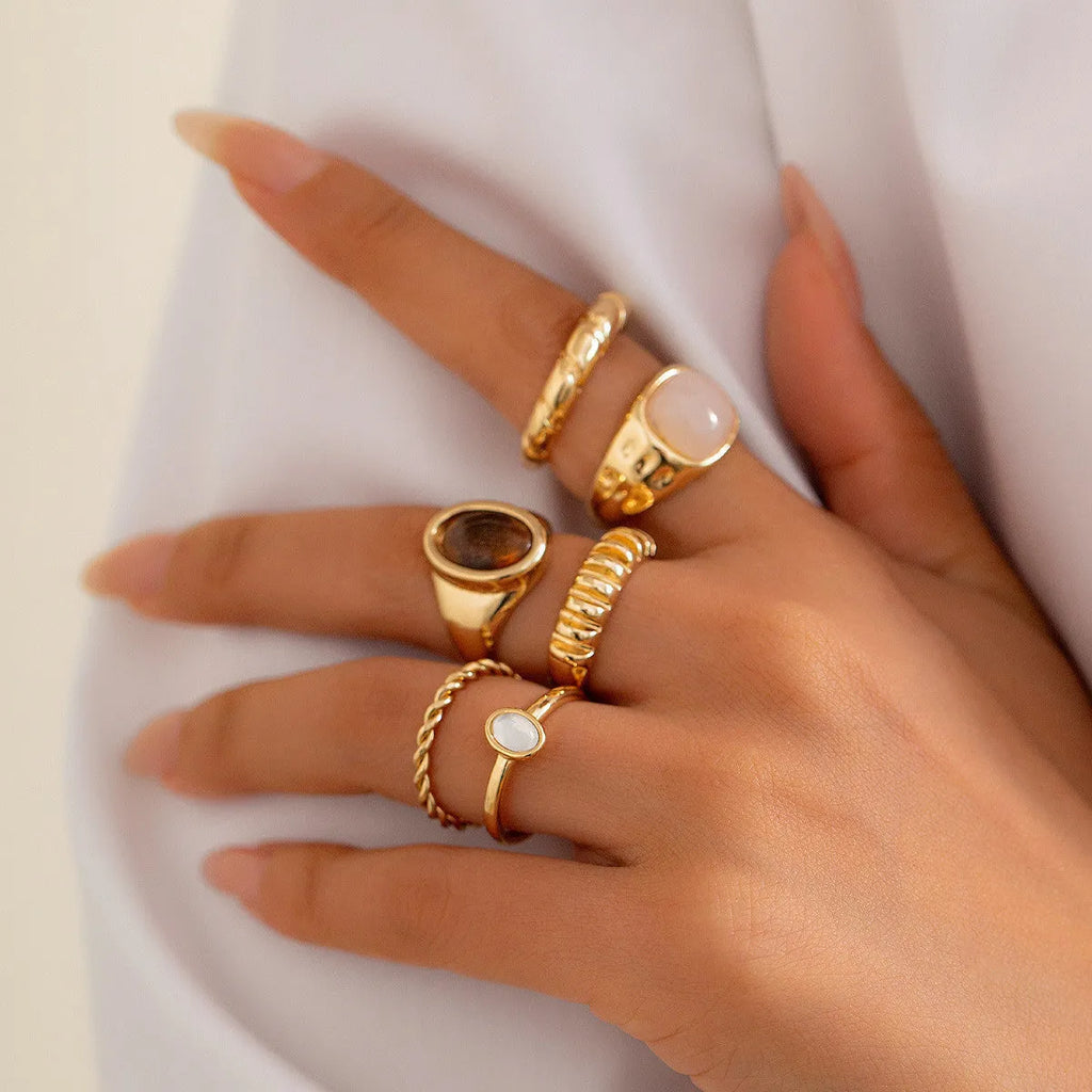 Light gold geometric ring set with six irregular alloy rings electroplated finish