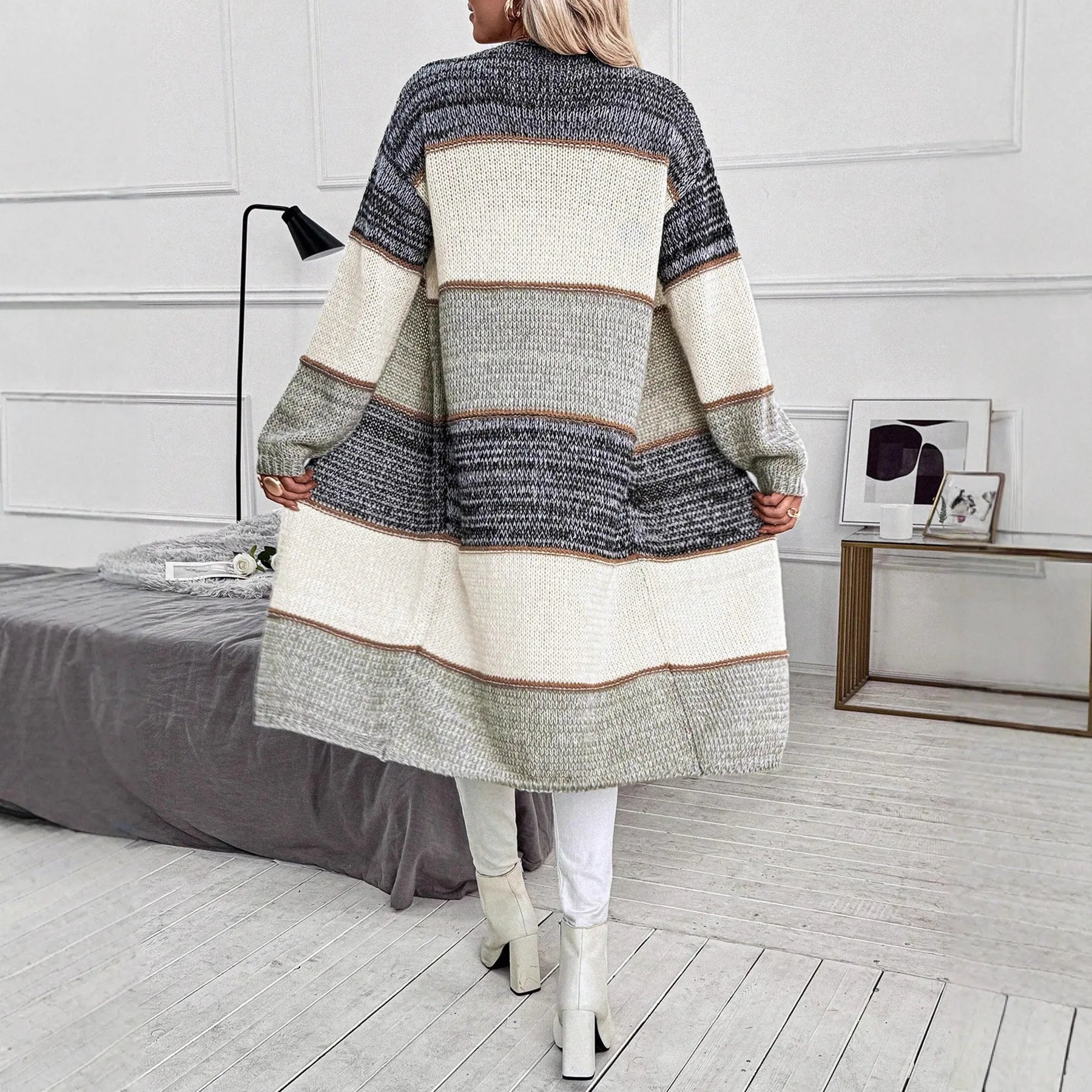 Grey striped women's knitted cardigan with long sleeves and loose fit