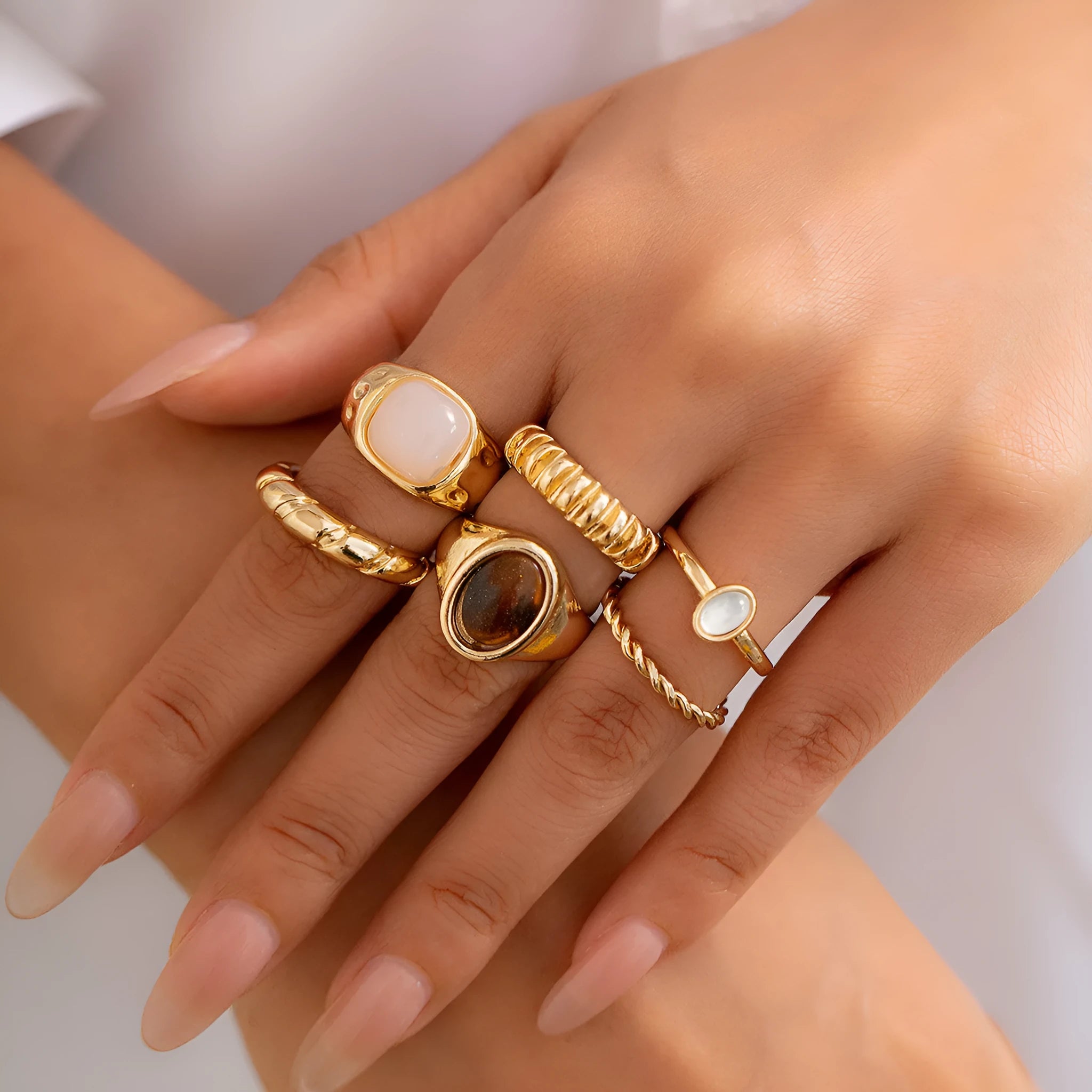 Light gold geometric ring set with six irregular alloy rings electroplated finish