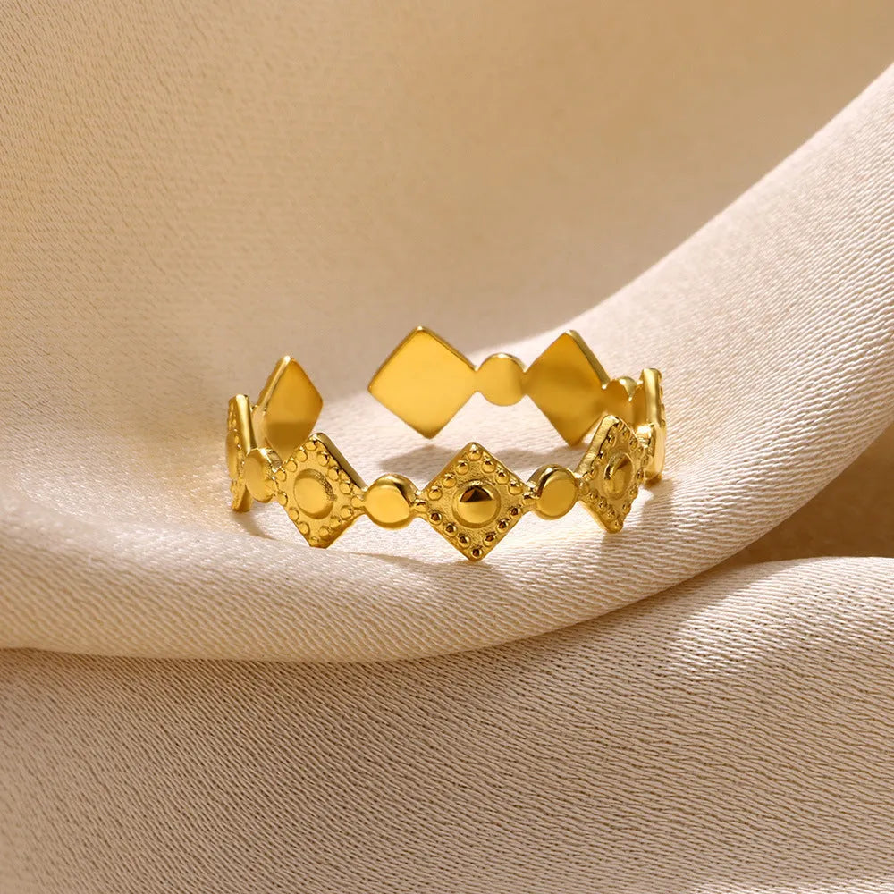 Titanium steel women's ring with geometric gold diamond pattern and free size adjustable design