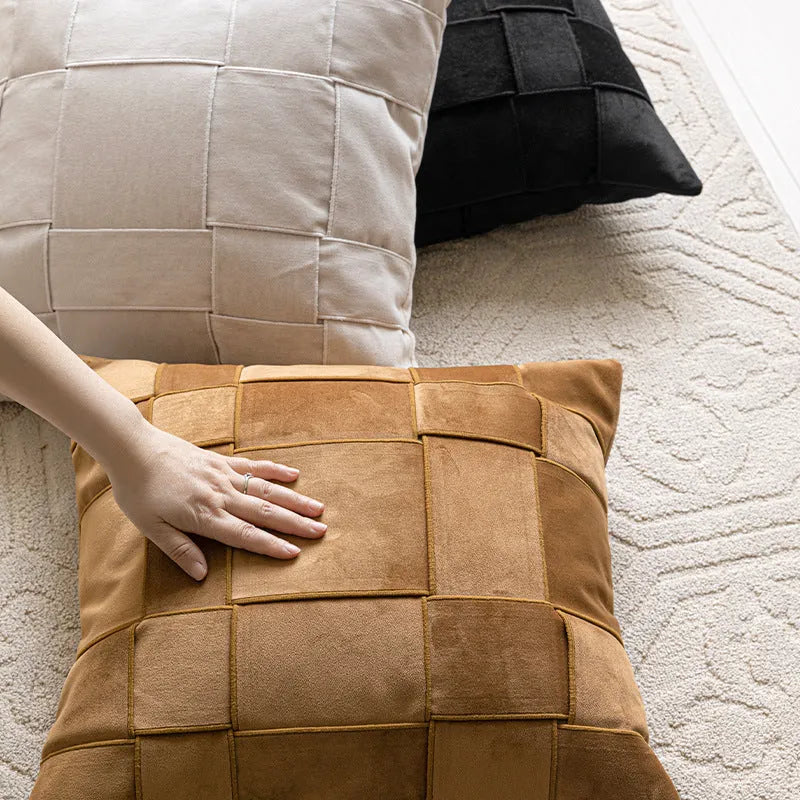Square chenille woven cushion in beige colour showing textured surface