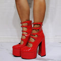 Women's waterproof platform high heel boots with serpentine belt buckle in patent leather