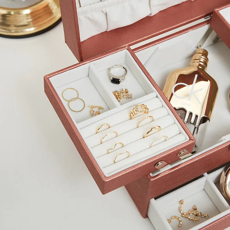 Hard-shell PU leather jewellery storage box in beige, black, pink, and rose gold colour options.