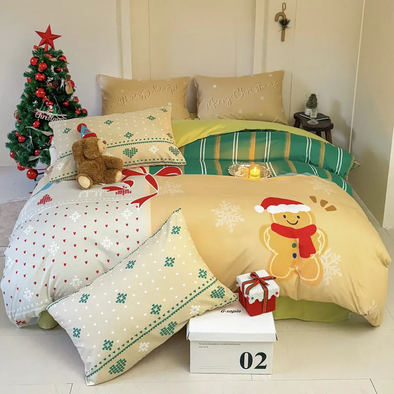 Christmas cartoon print bedding four-piece set showing sheet, duvet cover, and pillowcases.
