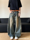 Men's retro blue distressed jeans with machete wash pattern and wide-leg design