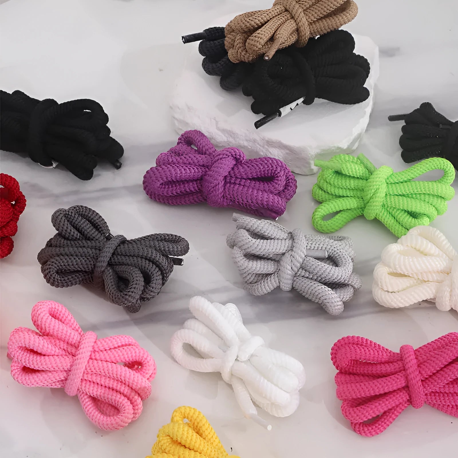 Oval shoelace adapter rope in multiple colours showing 1.0 width and length options for sneakers and sweatshirts.