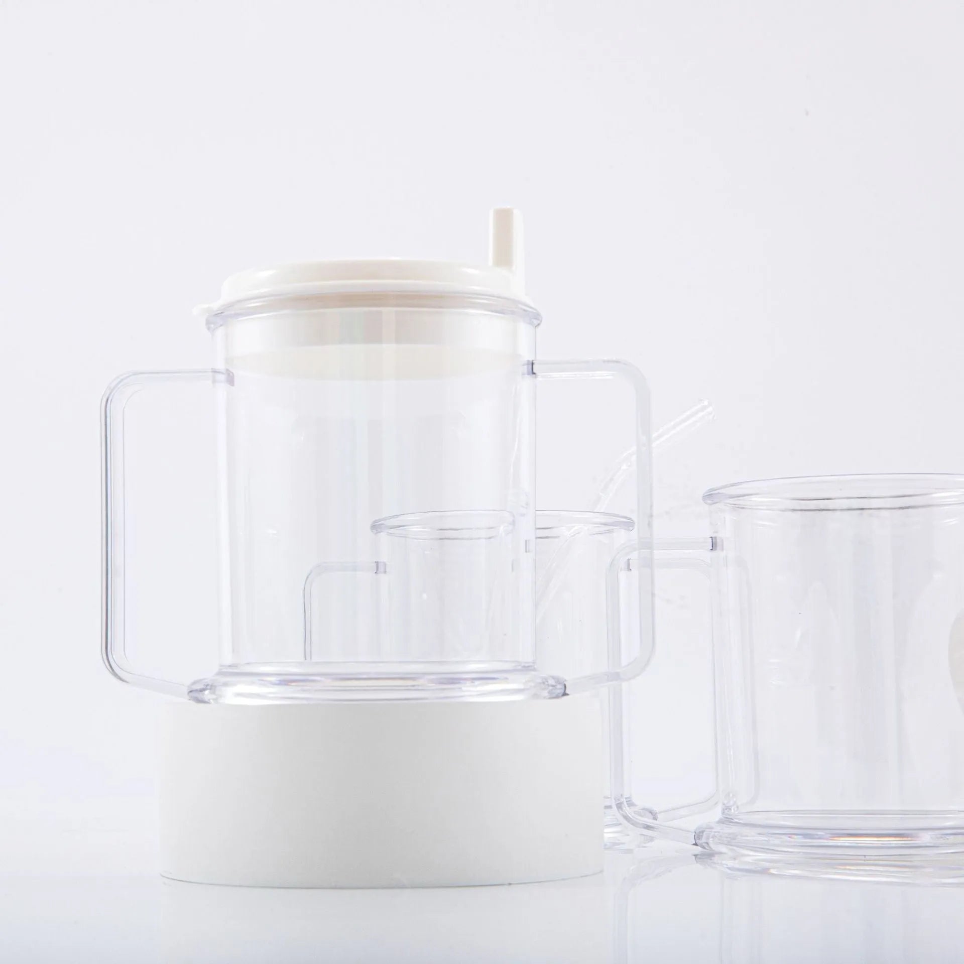 Transparent solid colour spill-proof drinking cup made from lightweight PP material.