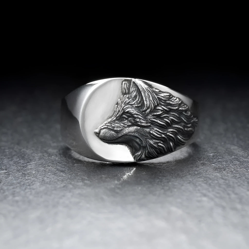 Men's silver geometric wolf head alloy ring on a dark background, showing detailed retro design.