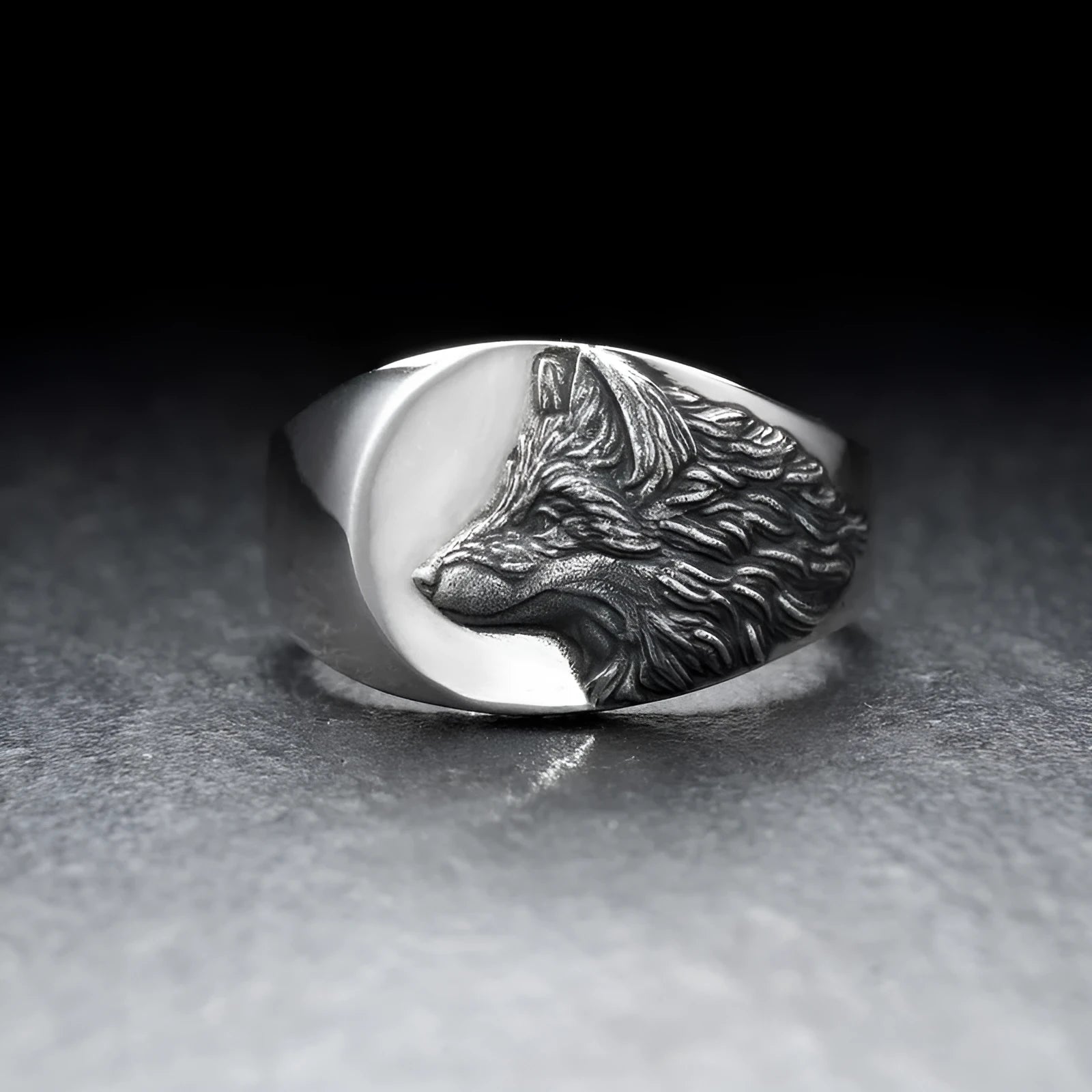 Men's silver geometric wolf head alloy ring on a dark background, showing detailed retro design.