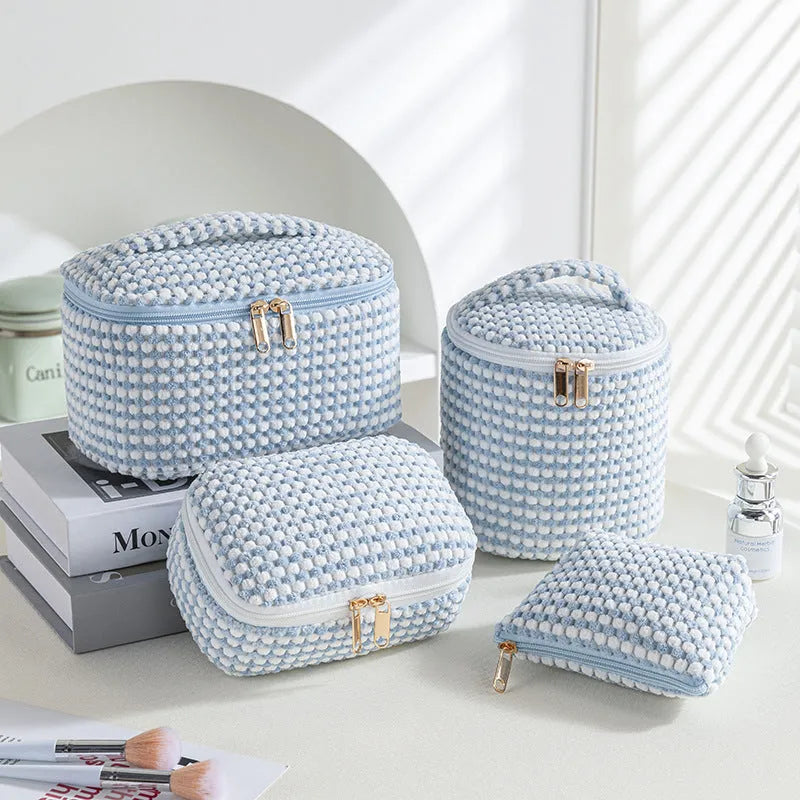 Flannelette makeup bag four-piece set in cube style with polyester construction