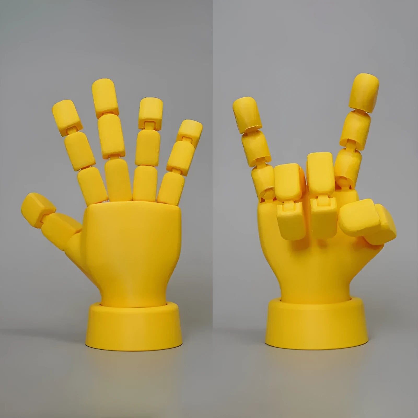 Yellow movable joint hand prop ornament with articulated fingers on white background