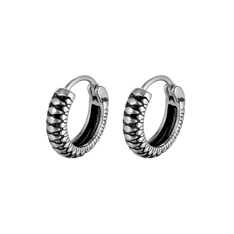Silver geometric striped drop earrings with retro twist design and round sports-style elements