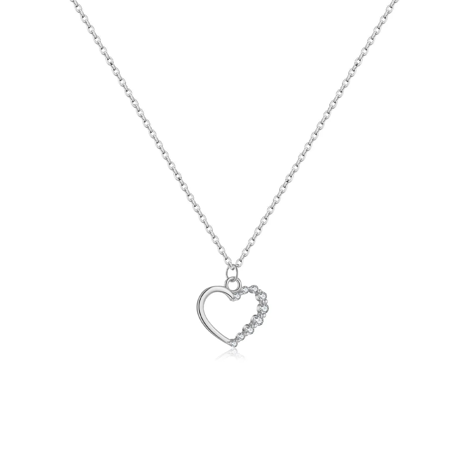 Sterling silver hollow heart pendant necklace on a classic chain, available in white gold or 18K gold plating.