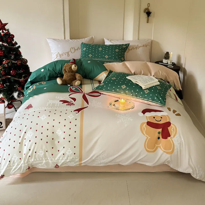 Christmas cartoon print bedding four-piece set showing sheet, duvet cover, and pillowcases.