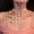 Women's alloy ribbon love pendant necklace on clavicle chain available in 33 colours