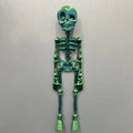 3D printed Halloween skull refrigerator magnet in modern art style with twelve colour options
