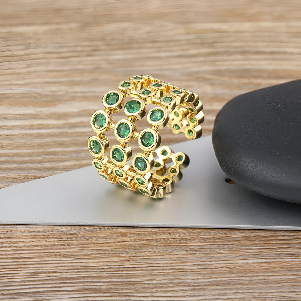 Copper 18K gold plated ring with three-layer green zircon setting in wide band design