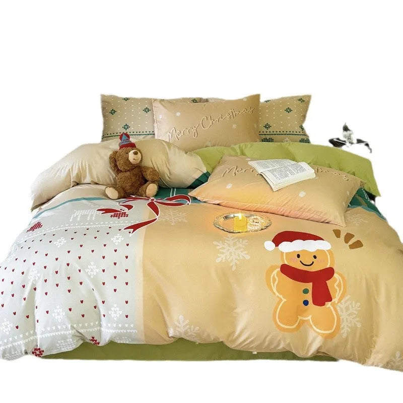 Christmas cartoon print bedding four-piece set showing sheet, duvet cover, and pillowcases.
