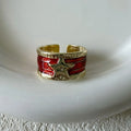Retro geometric copper ring with adjustable sizing and a distressed finish.