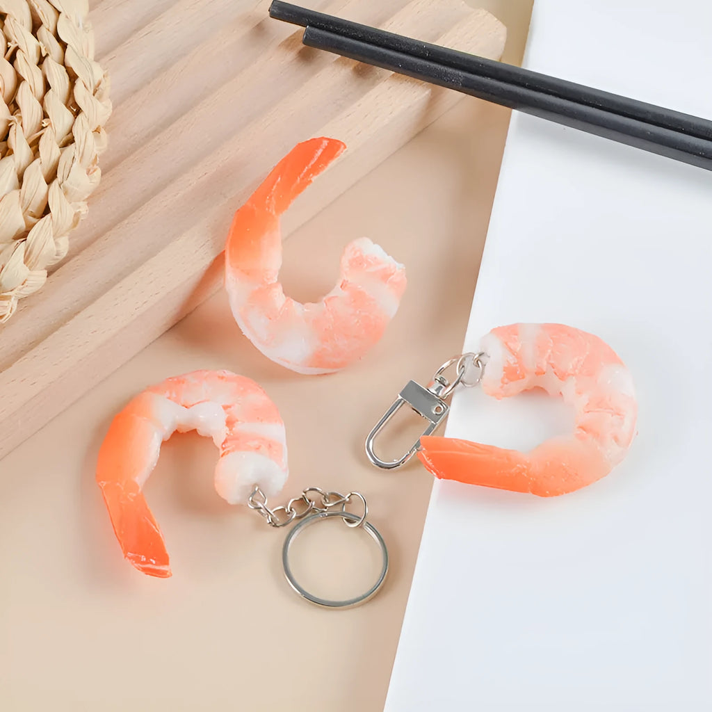 Modern minimalist PVC shrimp-shaped keychain with 1.5cm thickness.