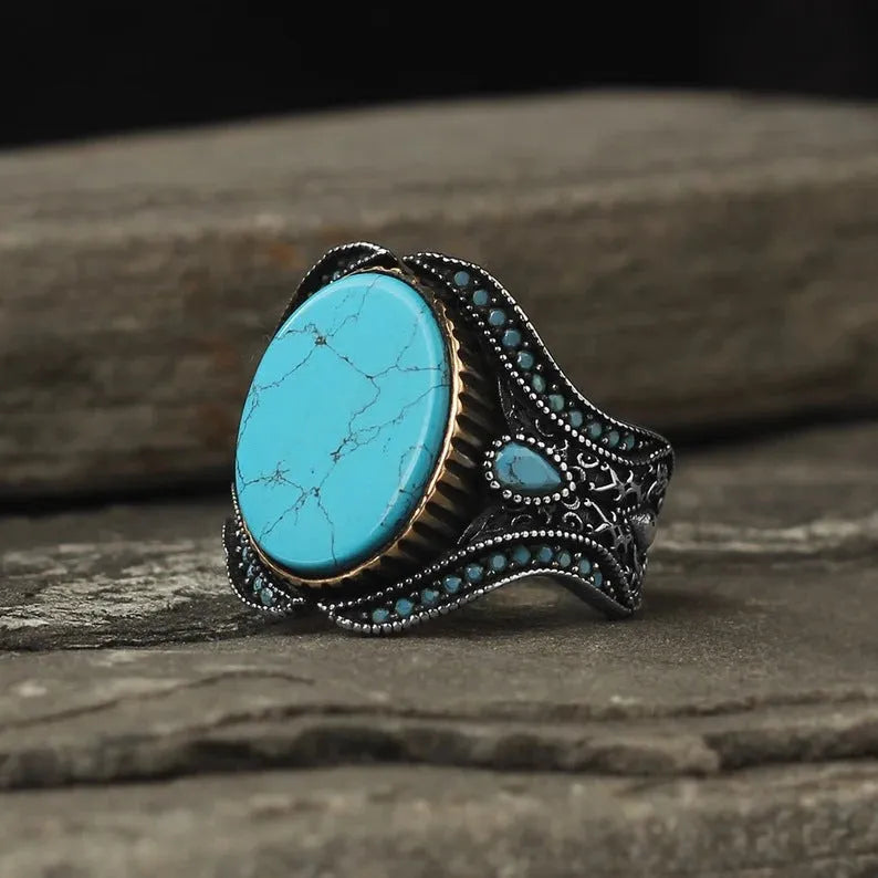 Men's antique silver turquoise alloy ring showing round band design