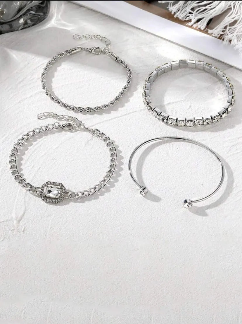 Four-piece retro metal chain bracelet set with square diamond geometric design in gold or silver tone alloy for women.