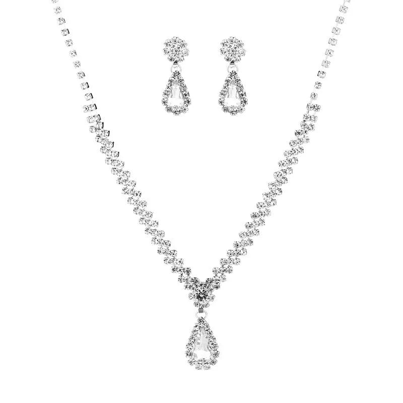 Women's rhinestone water drop necklace and earrings set on a claw chain in blue colour.