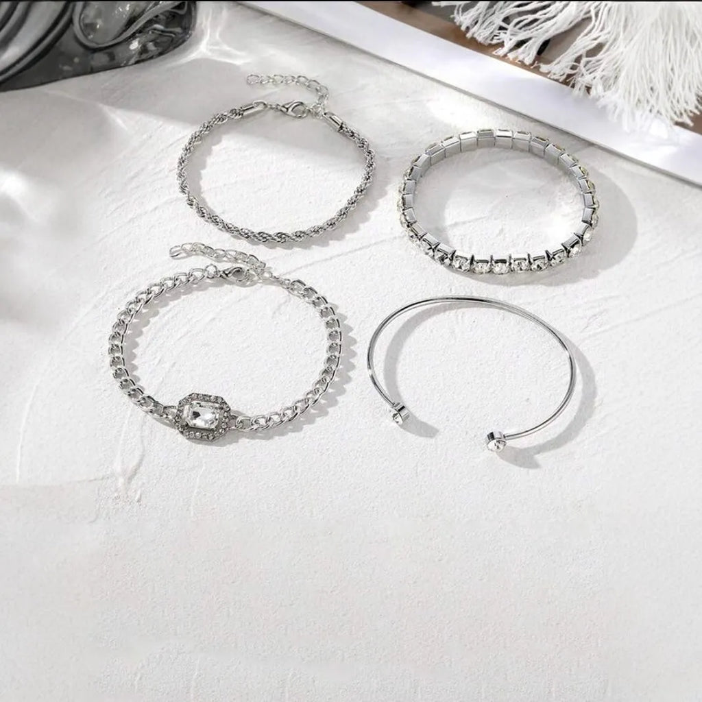 Four-piece retro metal chain bracelet set with square diamond geometric design in gold or silver tone alloy for women.
