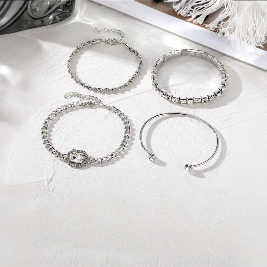 Four-piece retro metal chain bracelet set with square diamond geometric design in gold or silver tone alloy for women.