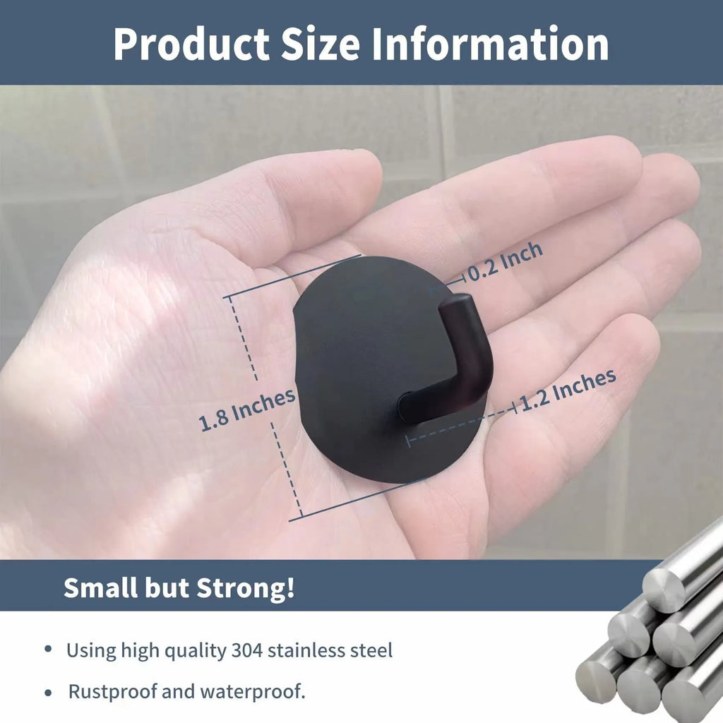 Two stainless steel self-adhesive wall hooks, one black and one polished, on a white background.