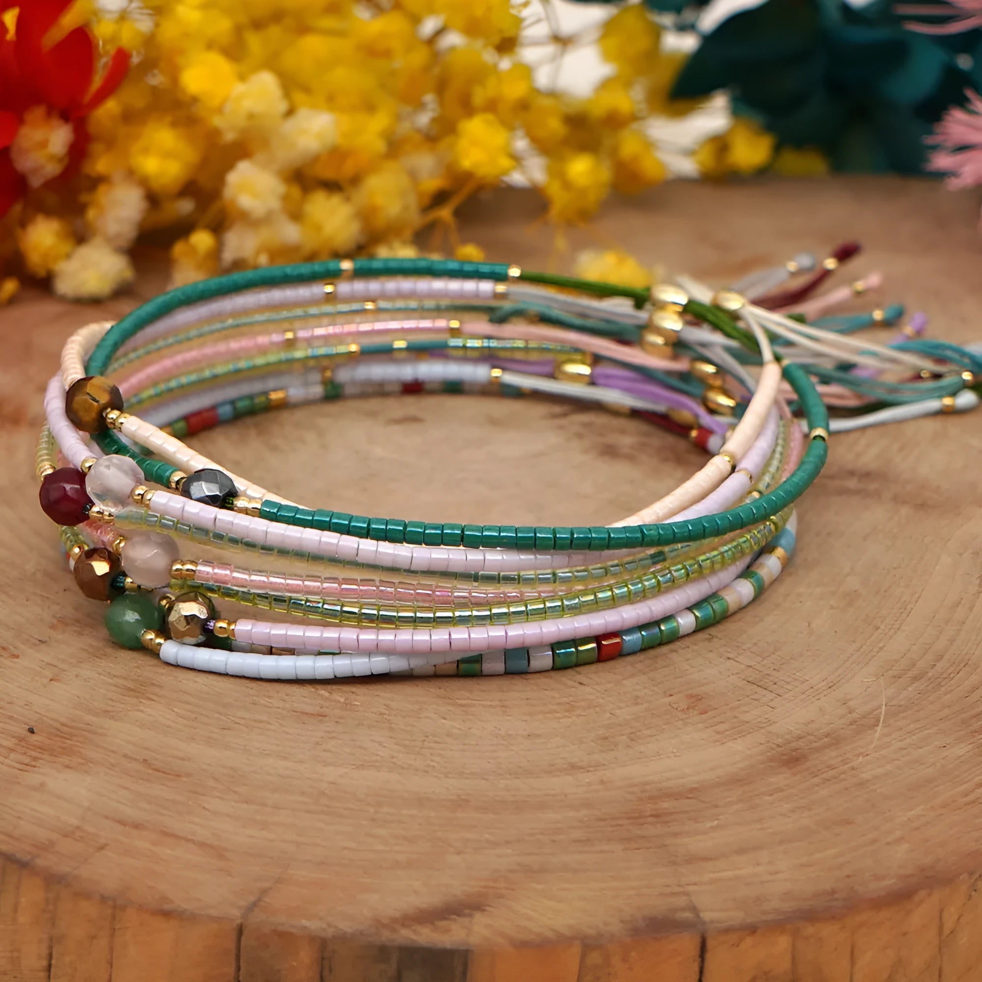 Handmade bohemian style bracelet with semi-precious stone and glass beads in geometric pattern