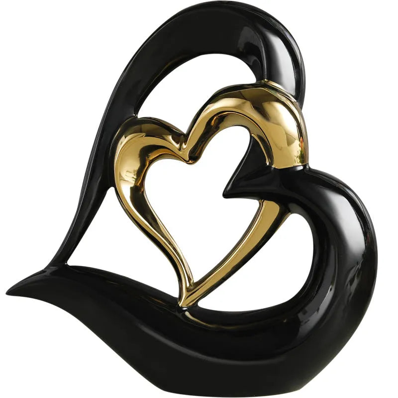 Modern white porcelain love heart ornament with geometric style on a table.