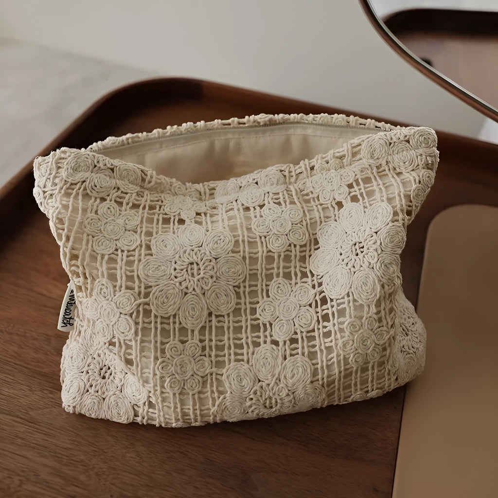 Handmade corduroy cosmetic bag with crocheted hollow flowers and ethnic embroidery, rope handle