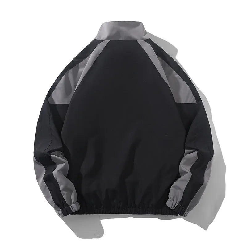 Men's black casual jacket with contrast colour stitching detail on the front, showing side seam pockets.