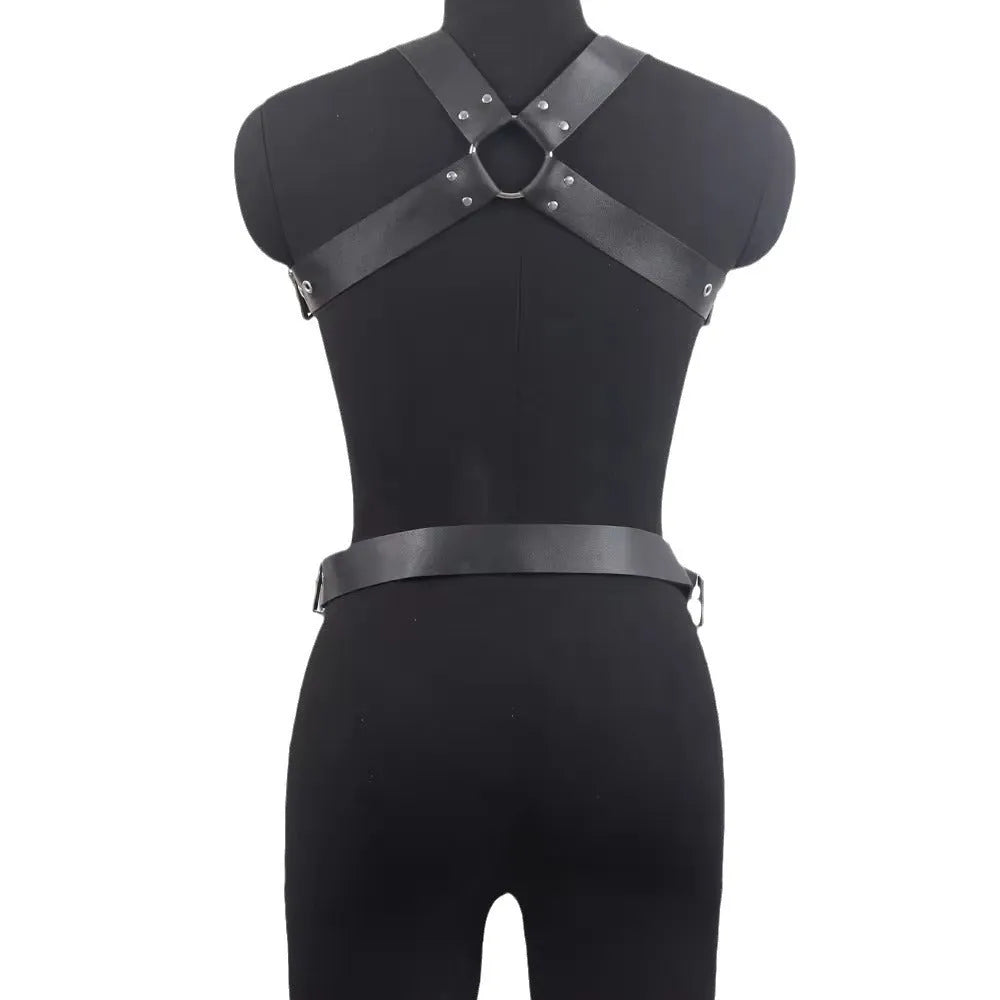 Thin black patent leather shapewear belt with a silver-tone pin buckle on a mannequin waist.